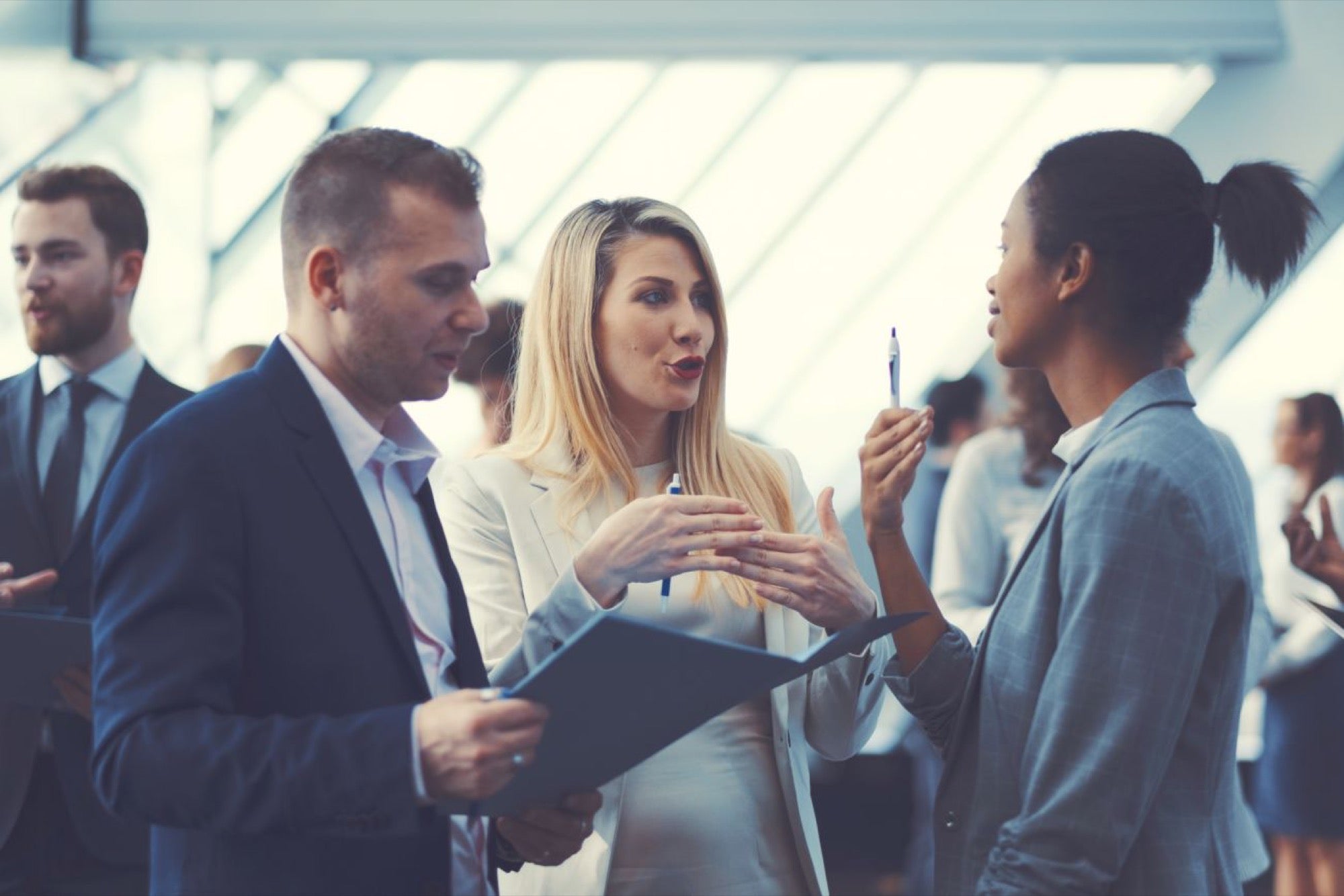 People enjoying a business conversation